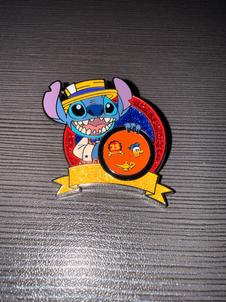 A Stitch Disney trading pin photographed for a US resale marketplace listing